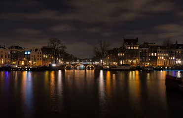 Fotobehang amsterdam canal at night © hansenn