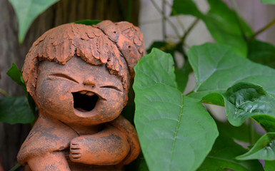 Clay dolls in the garden