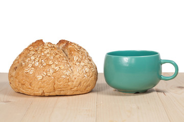 bread and coffee on a white background