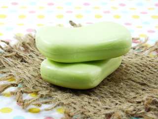 stacked of natural herbal soaps