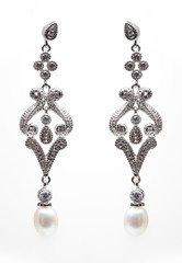 earrings with blue stones on the white