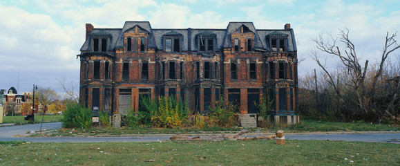 This is a deserted building in a bad part of town. It shows the urban wasteland of Detroit.