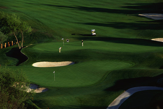 These Are Golfers Approaching The Green At Carmel Valley Ranch Golf Course, Designed By Pete Dye, In Carmel, California.