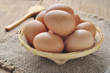 Eggs in bamboo basket.