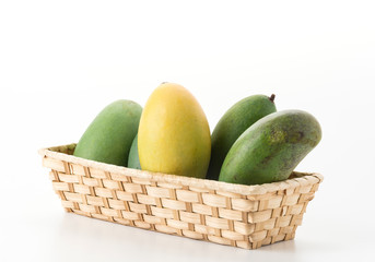 green and yellow mango on white background