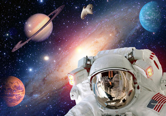 Astronaut spaceman helmet outer space solar system planet universe. Elements of this image furnished by NASA.