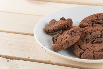 soft dark chocolate brownie cookies on wood
