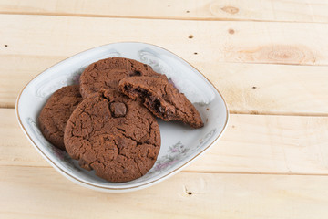 soft dark chocolate brownie cookies on wood