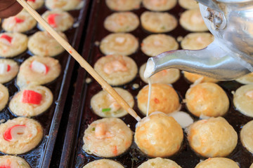 Takoyaki making, Thailand.
