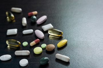 diferent Tablets pills capsule heap mix therapy drugs doctor flu