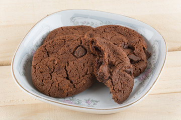 soft dark chocolate brownie cookies on wood