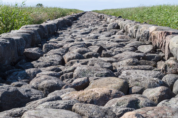 Closeup on large stones of Ainazi North Pier, Latvia