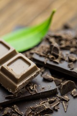 Chocolate with mint on a wooden table