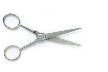Scissors on white background