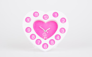 heart shape clock on white background
