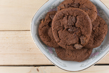 soft dark chocolate brownie cookies on wood