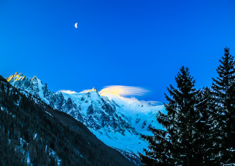 Moon rises above the Mount Blanc in France.