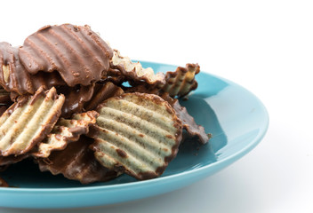 potato chip with chocolate on white