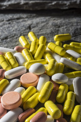 Stack of different colorful pills