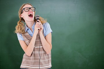 Composite image of geeky hipster woman 