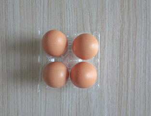 Closeup of a brown egg on a  table