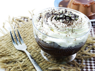 brown chocolate cupcake with chocolate sprinkles