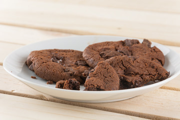soft dark chocolate brownie cookies on wood