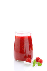 jar with raspberry jam on a white background