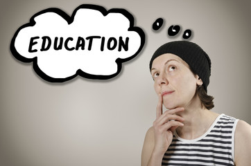 Conceptual Education Text on White Speech Bubble Above Thinking