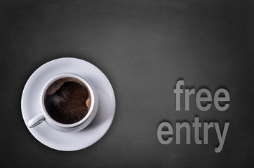 Free entry word on blackboard with coffee cup