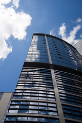 Fototapeta na wymiar High building on a background of blue sky