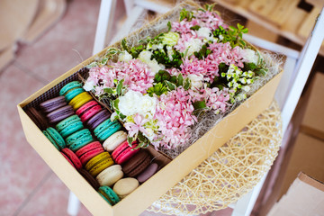 Flowers and macaroon in the box