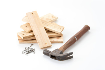 hammer and nail with wood