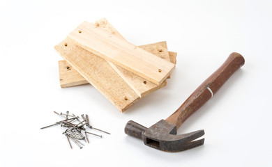 hammer and nail with wood