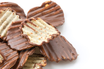 potato chip with chocolate on white