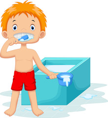 Young boy brushing teeth