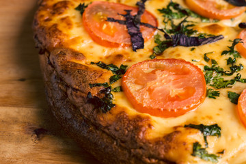 Homemade pizza on the wooden board