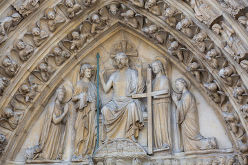 Fototapeta na wymiar Paris - West facade of Notre Dame Cathedral. The Last Judgment portal and tympanum