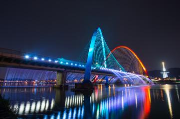 Fototapeta na wymiar Rainbow fountain show at Expo Bridge in South Korea.