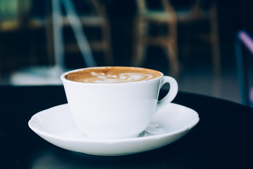 cup of coffee - soft focus with vintage film filter