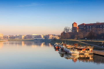 sunrise over the historic royal Wawel Castle in Cracow, Poland