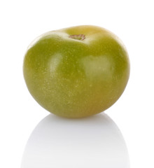 Green tomato isolated on white