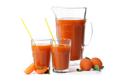 Glasses of apricots juice isolated on white