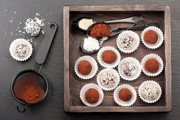 Various chocolate truffles. top view, horizontal