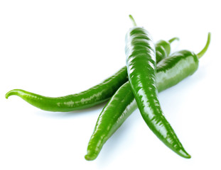 Green hot peppers isolated on white