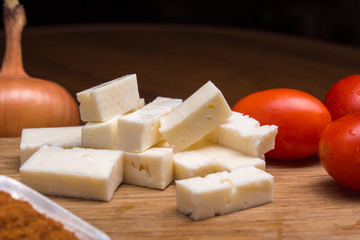 cubes of cheese and chili peppers