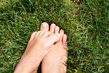 Funny Foot on green grass above