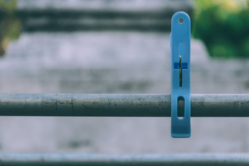 clothespin on bar - soft focus with film filter
