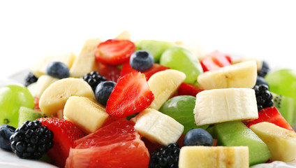 Fresh fruit salad on white background
