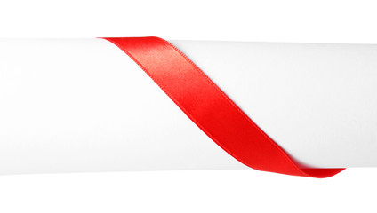 Shiny red ribbon with card isolated on white